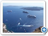 Cruise ships anchored off the coast of Santorini.